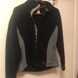 Black and grey The NORTH Face jacket